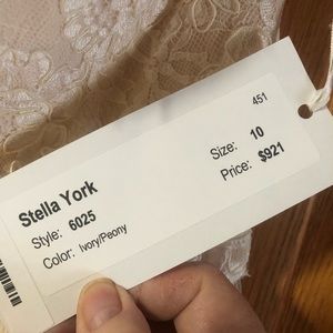 Wedding dress. Never worn. With tags.